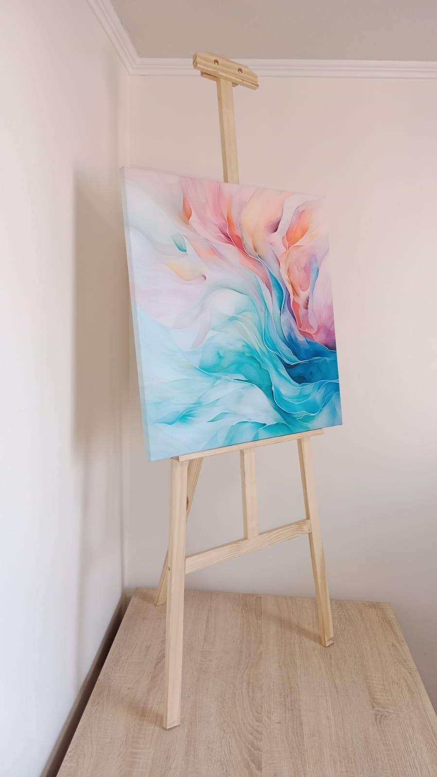 Cuadro decorativo vertical abstracto en tonos pastel sobre atril
