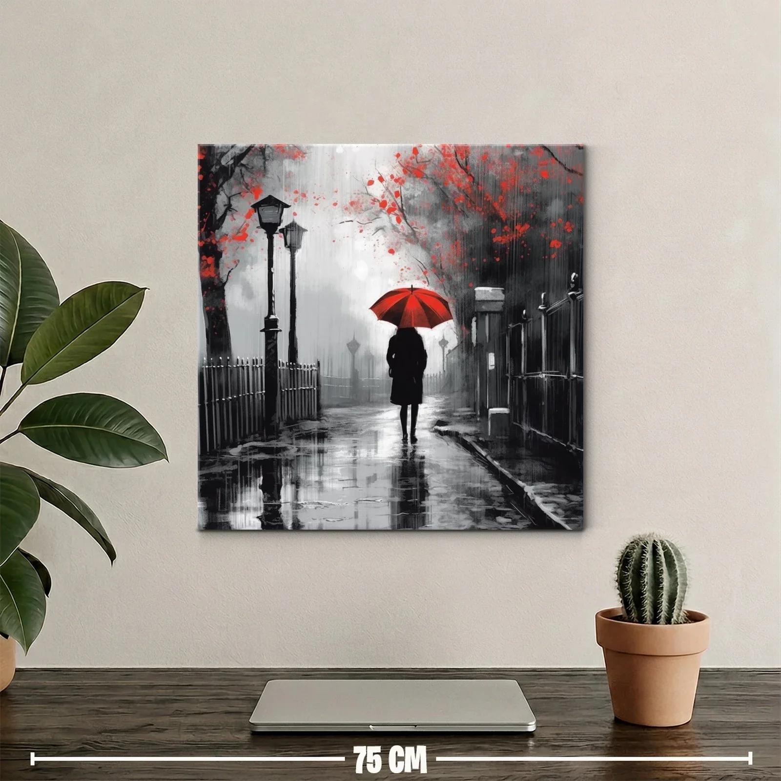 Figura solitaria bajo paraguas rojo en escena urbana lluviosa — miniatura 2
