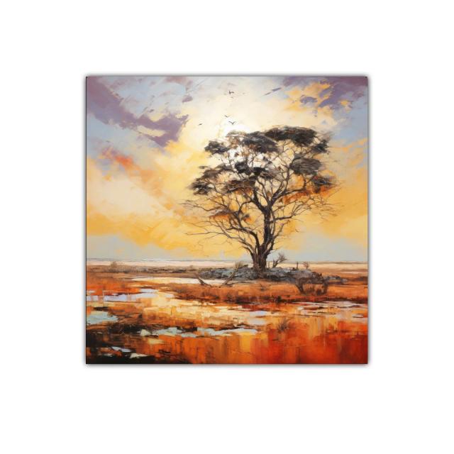 Solitaria silueta de árbol al atardecer en paisaje abierto