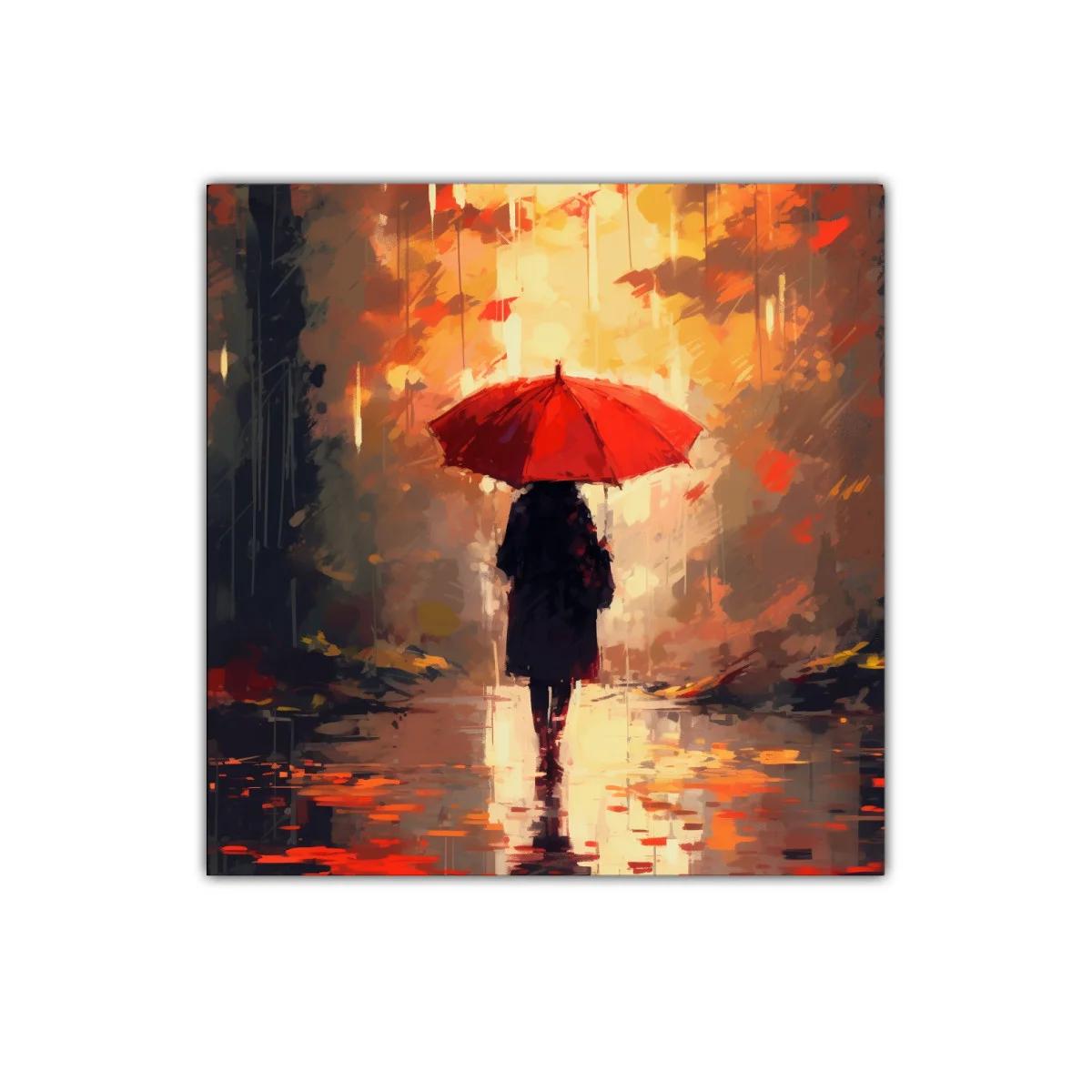Caminante bajo paraguas rojo en paisaje otoñal