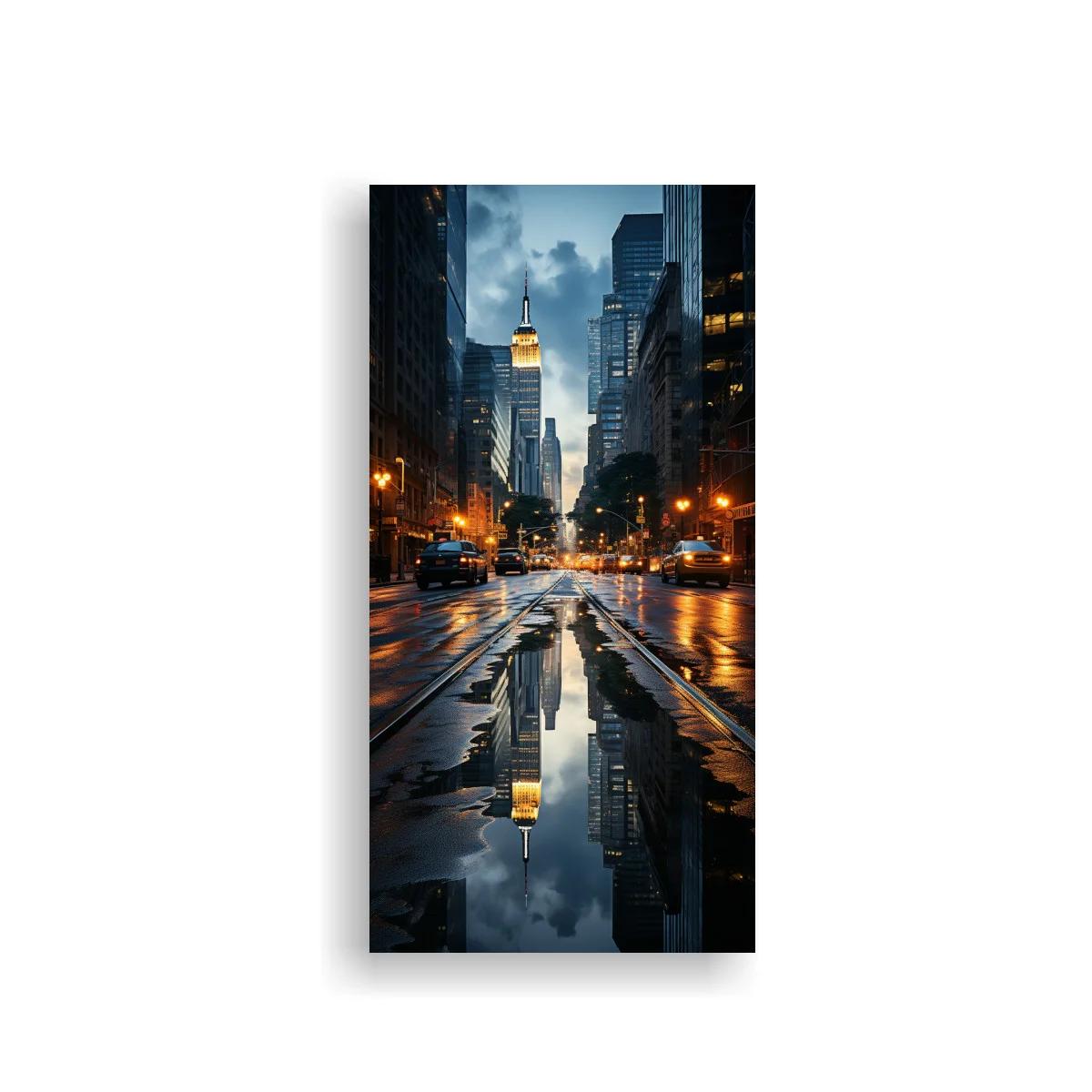 Cuadro avenida lluviosa con rascacielos y luces anaranjadas