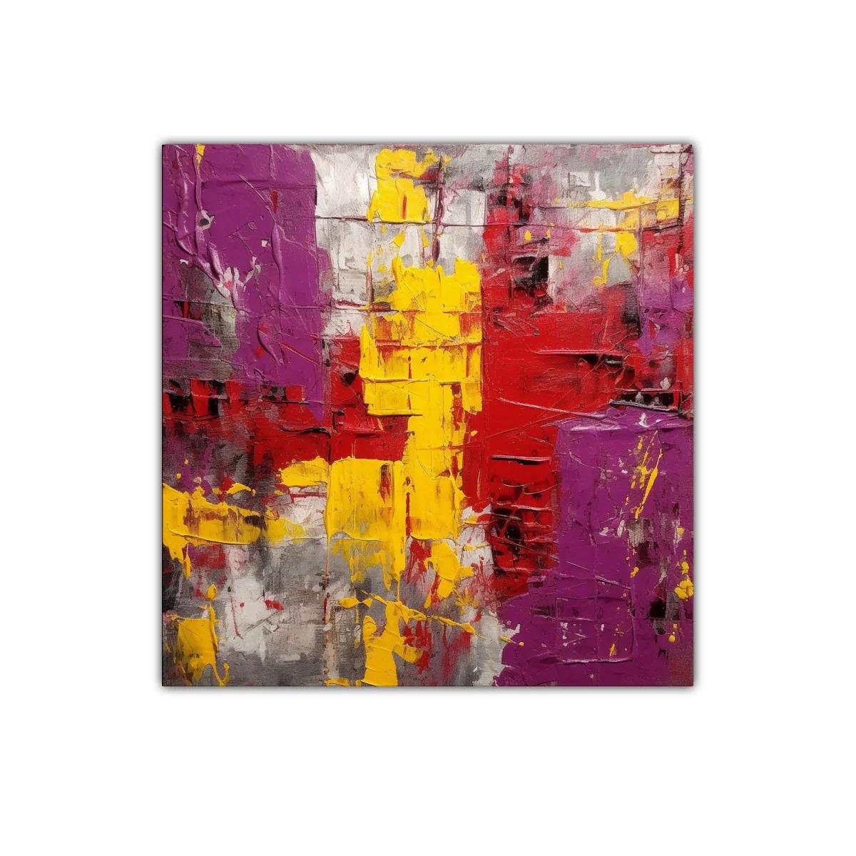 Cuadro abstracto en tonos vivos rojos amarillos y morados