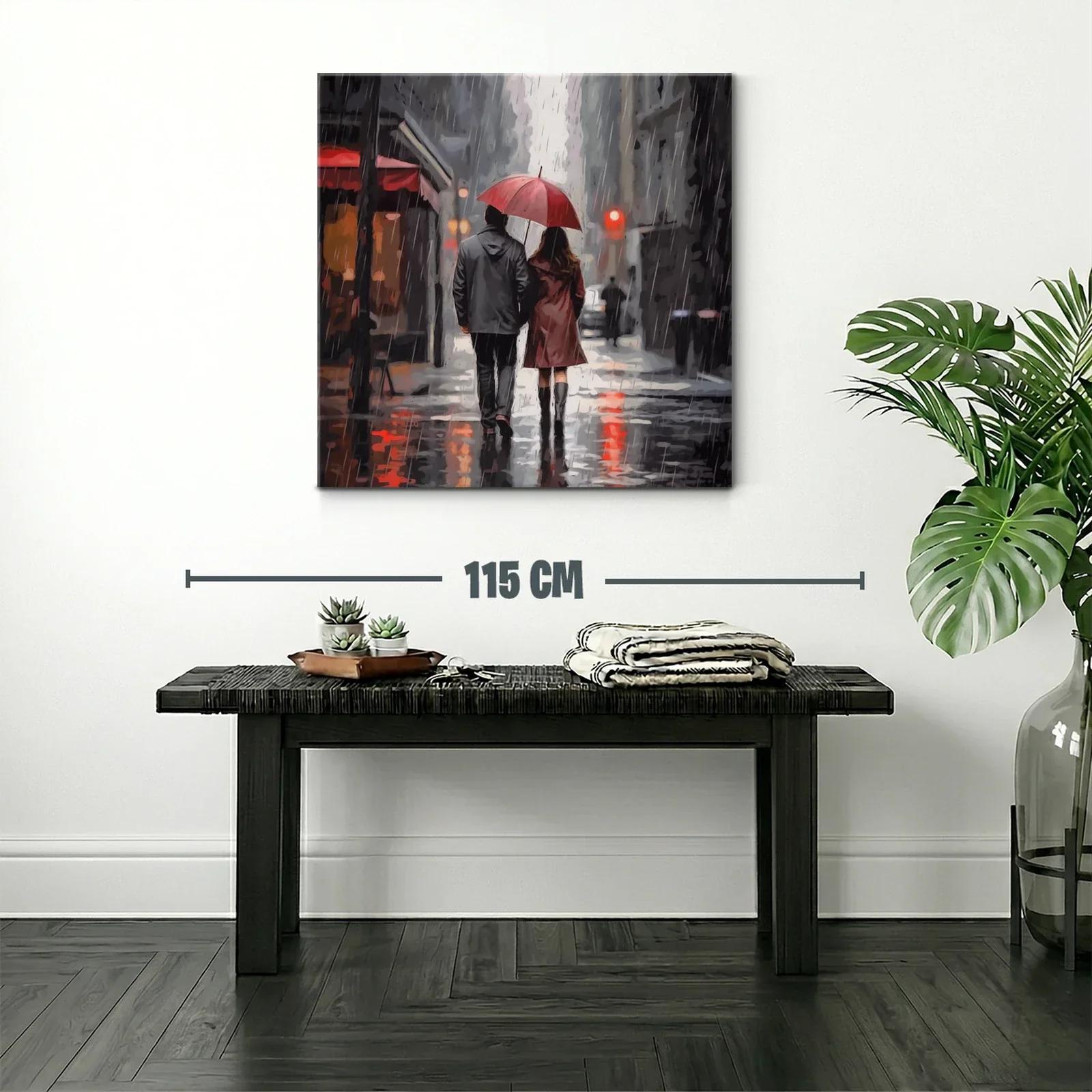 Pareja caminando bajo la lluvia con paraguas rojo — miniatura 2