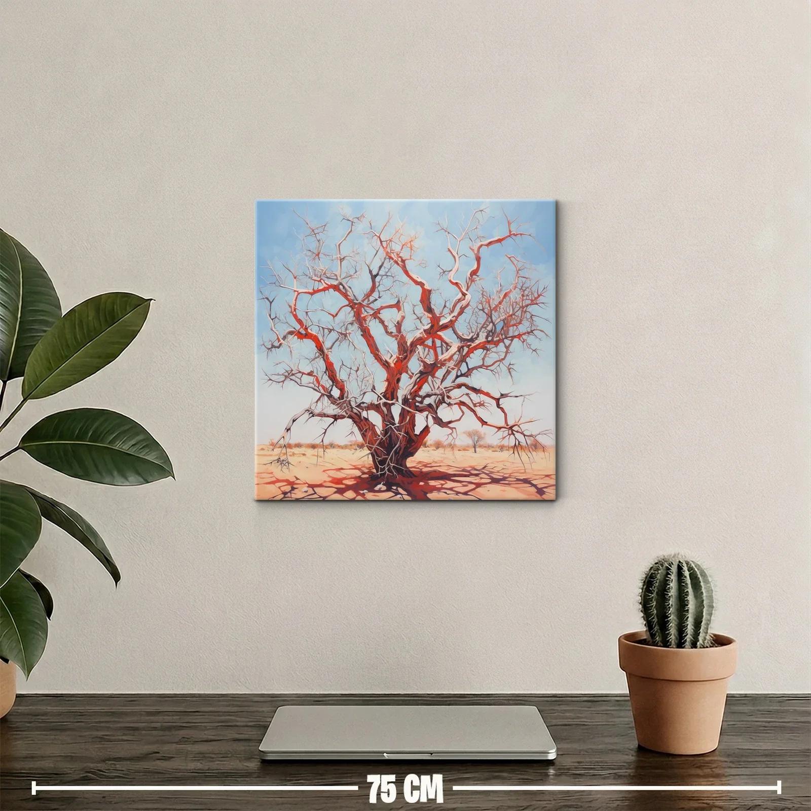 Árbol seco rojizo bajo cielo azul claro en paisaje árido — miniatura 2