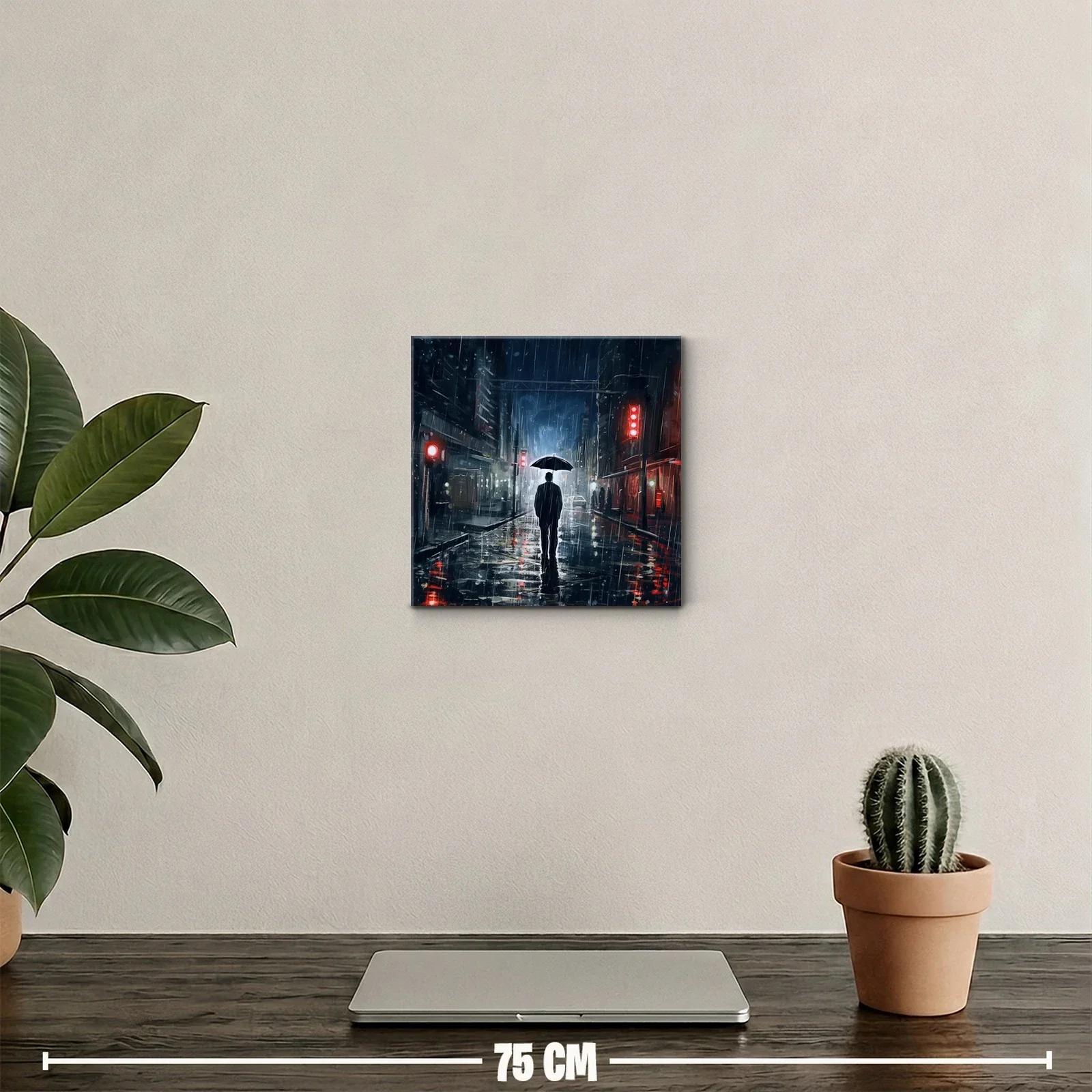 Figura solitaria bajo la lluvia en ciudad nocturna — miniatura 2