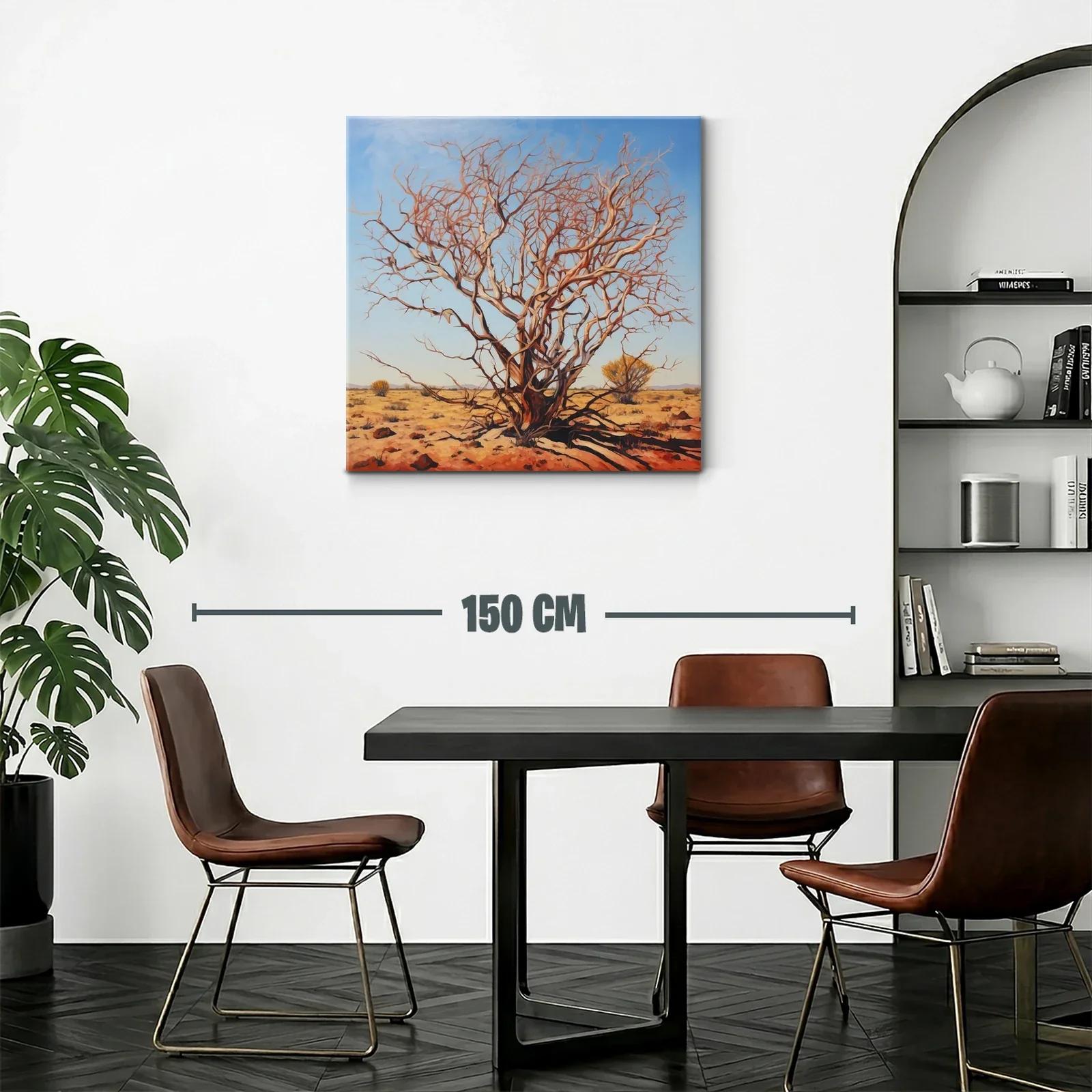Árbol desnudo en paisaje árido y cielos azules claros — miniatura 2