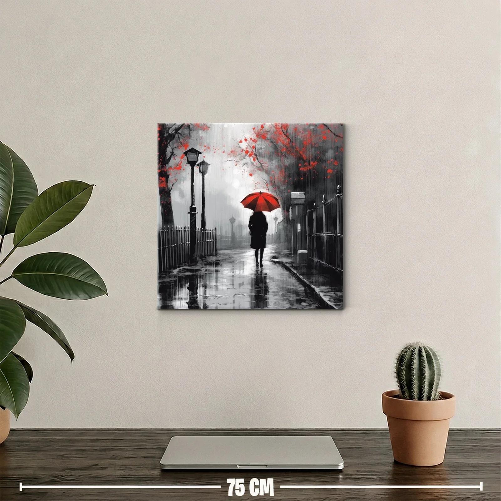 Figura solitaria bajo paraguas rojo en escena urbana lluviosa — miniatura 2