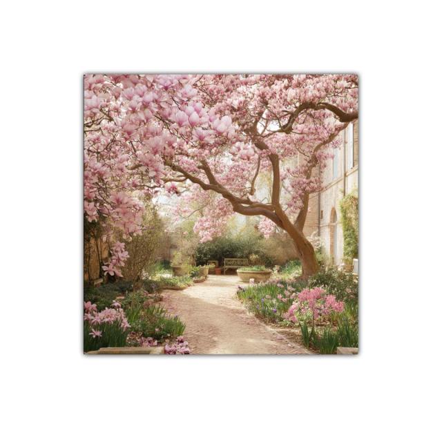 Jardín florecido con árbol de magnolia rosa en primavera