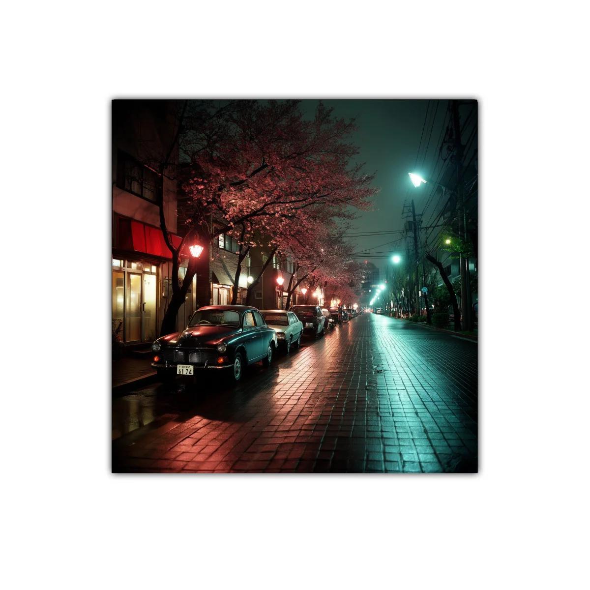 Calle nocturna con árboles rosados y coches clásicos — miniatura 1