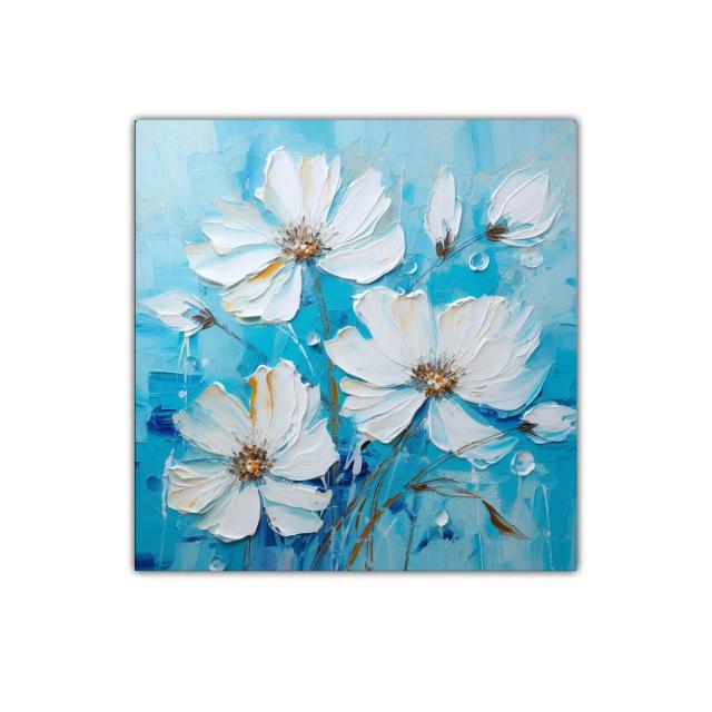 Cuadro decorativo de flores blancas sobre fondo azul