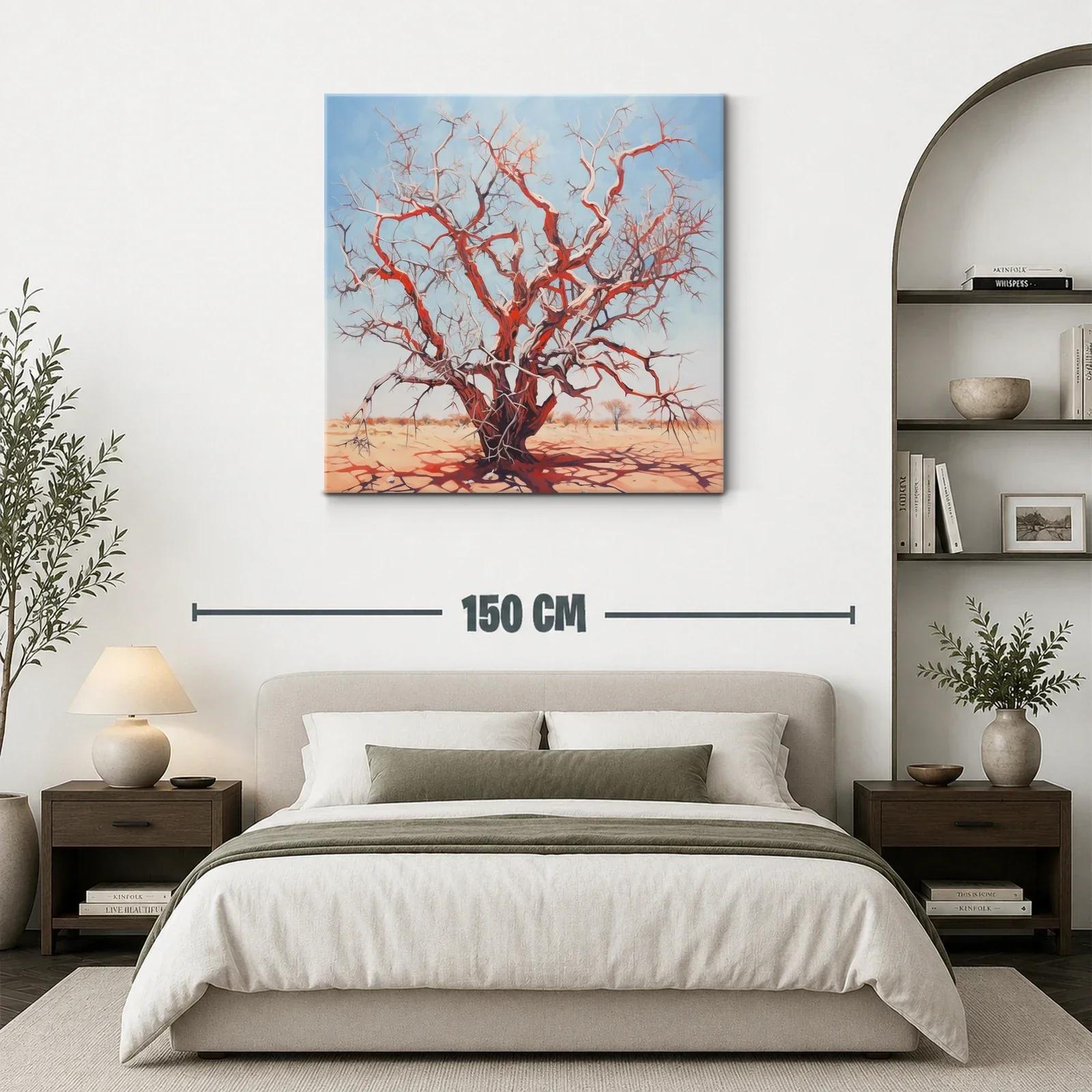 Árbol seco rojizo bajo cielo azul claro en paisaje árido — miniatura 3
