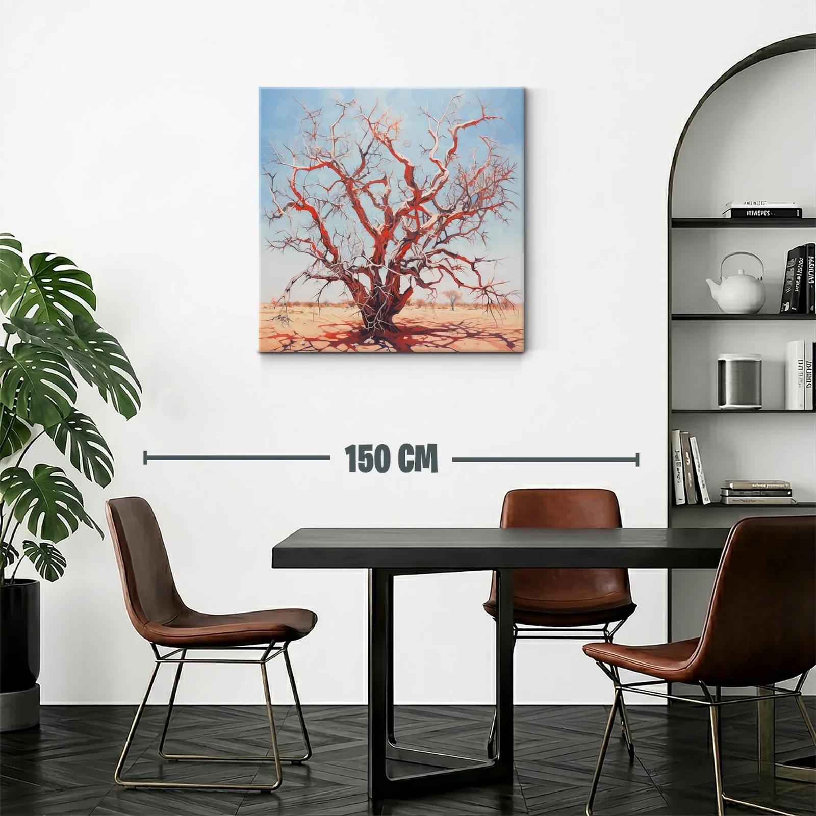 Árbol seco rojizo bajo cielo azul claro en paisaje árido — miniatura 2