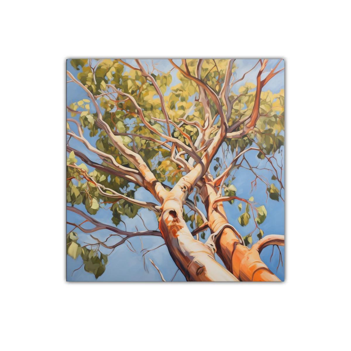 Árbol con ramas extendidas y follaje verde bajo cielo azul — miniatura 1