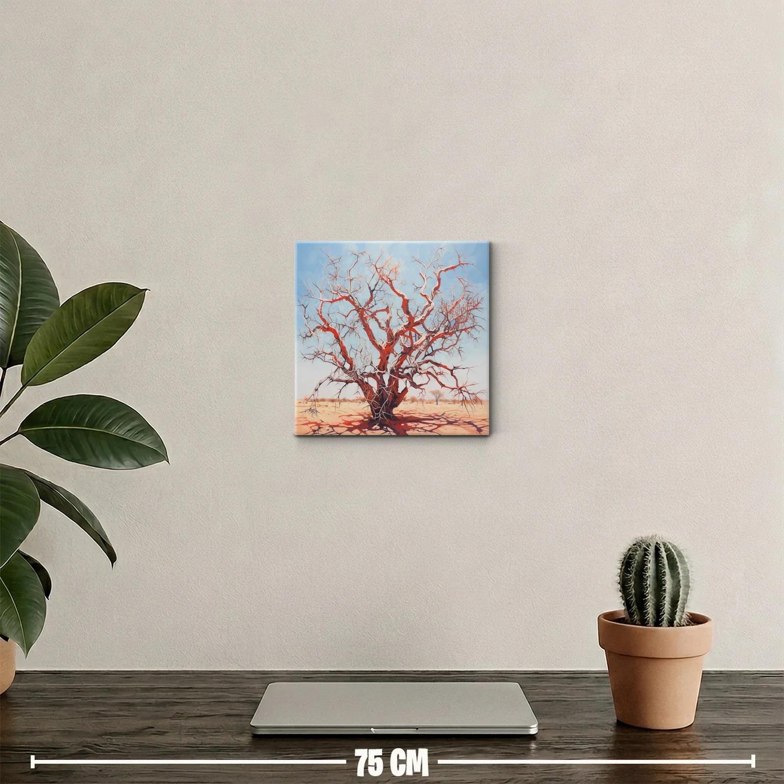 Árbol seco rojizo bajo cielo azul claro en paisaje árido — miniatura 2